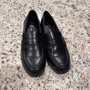Slip on black leather loafer, never worn.